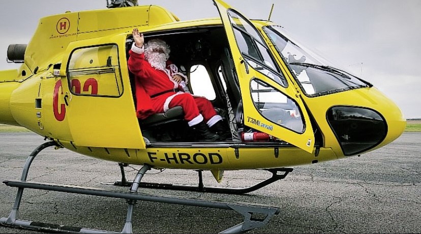 Le Père Noël en hélicoptère